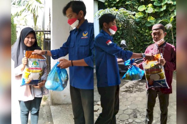 Jumat Berbagi, Pagi-pagi Kader NasDem Irawan Said alias ‘Iwan Garuda’ Keliling Lorong di Makassar Bagi Sembako