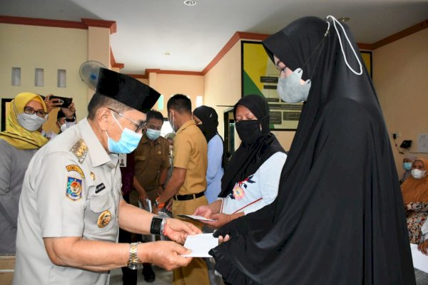 Walikota Palopo Judas Amir Hadiri Pendistribusian Zakat Mal