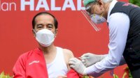 Jokowi Batalkan Vaksinasi Berbayar