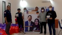 NasDem Peduli, Tim Legislator Sulsel Rezki Lutfi Bagi Ratusan Nasi Dos di 4 Kecamatan di Makassar