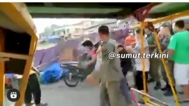 Diduga Satpol PP Keroyok warga di pasar.(F-INT)