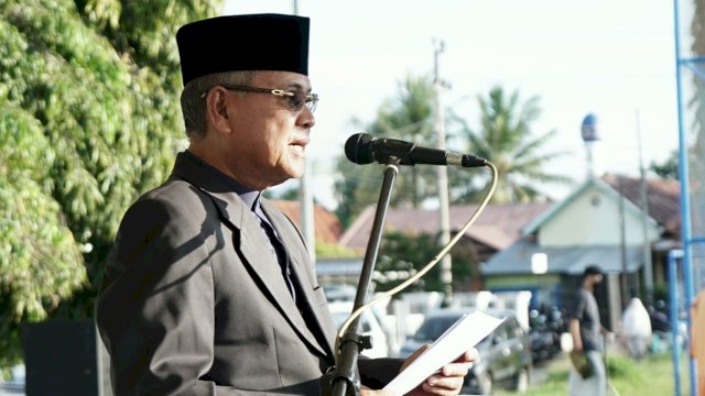 Bupati Basmin Mattayang Ajak masyarakat Tetap Terapkan Prokes.