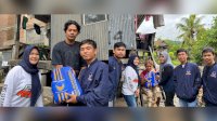 Jumat Berkah, Pembalap Angga Sapurede Keliling Rumah Bagi Sembako Bareng NasDem Milenial RMS Pinrang