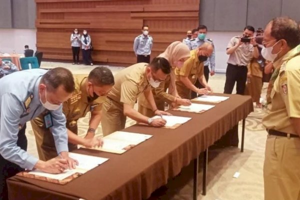 Kepala Disdag Makassar Arlin Ariesta Tandatang Kerjasama HAKI Kanwil Hukum dan HAM