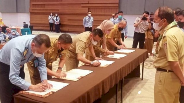 Kepala Disdag Makassar Arlin Ariesta Tandatang Kerjasama HAKI Kanwil Hukum dan HAM