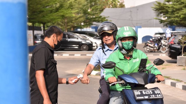 Dirut PDAM Beni Iskandar naik Ojol ke Kantor.(f-IST)