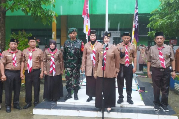 Salut! Walau Diguyur Hujan, Wawali Fatmawati Rusdi Tolak Dipakaikan Payung dan Memilih Hujan-hujanan Saat Tutup Lomba Tingkat II Kwarran Rappocini