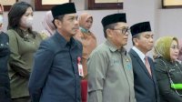 Kenakan Baju PHS, Kaban Bapenda Firman Pagarra Turut Hadiri Pengukuhan Lingkup Pemkot Makassar