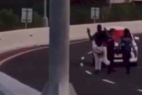 Viral! Kenakan Baju Hitam, WNA Adang Mobil di Jalan Tol Bali Mandara