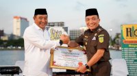 Leonard Simanjuntak Pamit Pindah Tugas, Pj Gubernur Sulsel Berikan Penghargaan