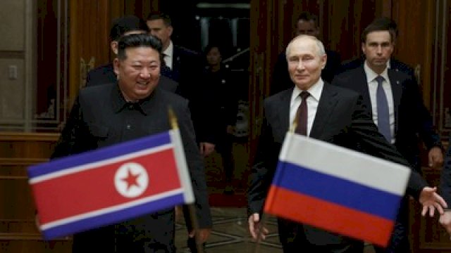 Putin dan Kim Jong Un.(F-INT)