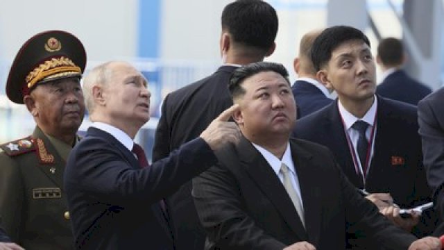 Vladimir Putin dan Kmi Jong Un.(F-INT)