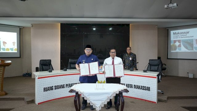 Penandatanganan nota kesepahaman (MoU) antara Pemerintah Kota Makassar dan Kejaksaan Negeri Makassar terkait penanganan perkara perdata dan tata usaha negara.
