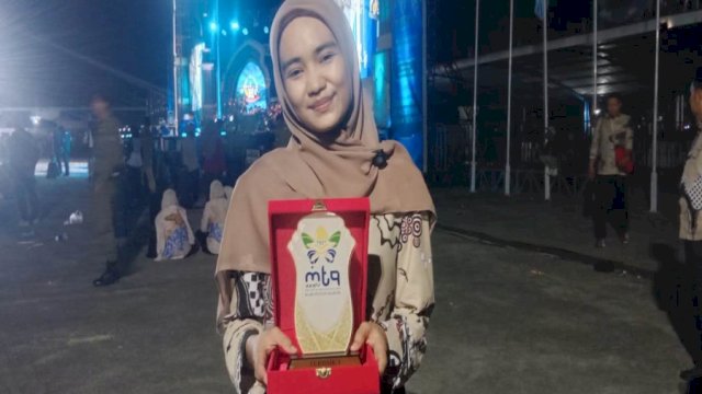 Nasywah Aqilah Shahib sukses meraih juara 1 cabang Karya Tulis Ilmiah Al-Qur&rsquo;an (KTIQ) kategori remaja putri.